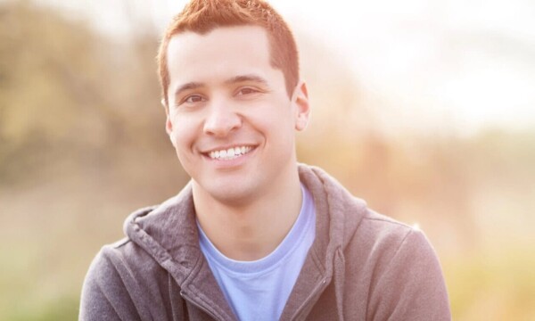 Mixed race man smiling
