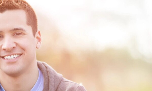 Mixed race man smiling